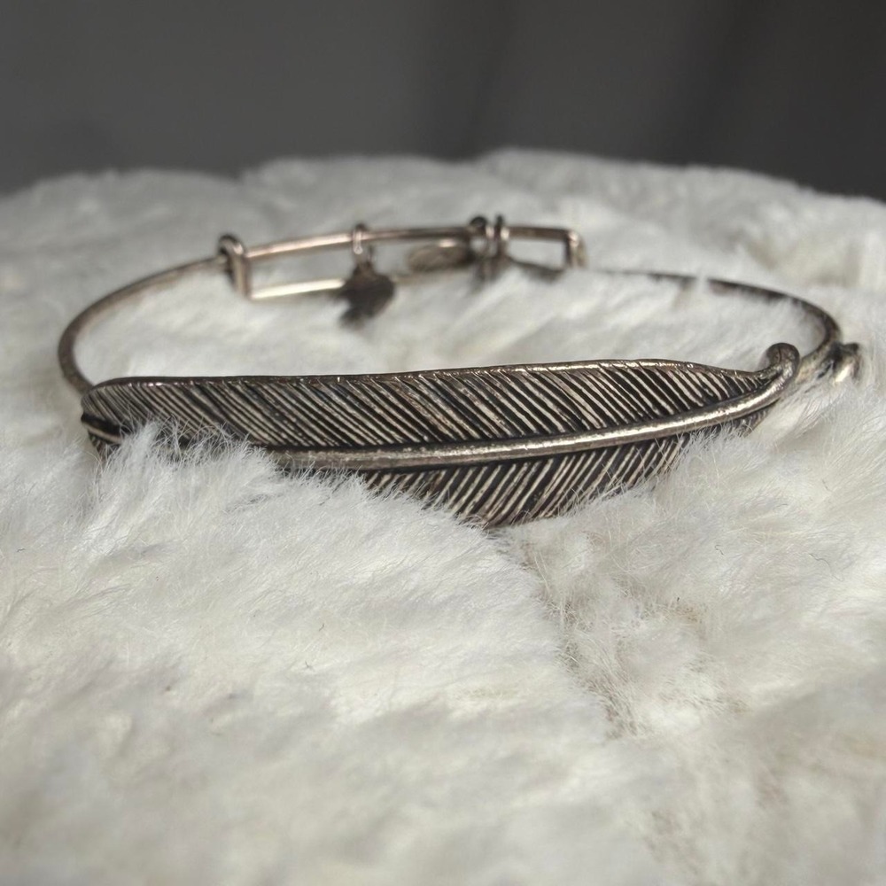 Alex and Ani silver feather bangle with engraved feather design